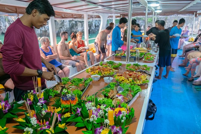 Amazing Phang Nga Bay Day Trip with Kayaking & Snorkelling - Khai or Lawa Island: swimming time with a catch