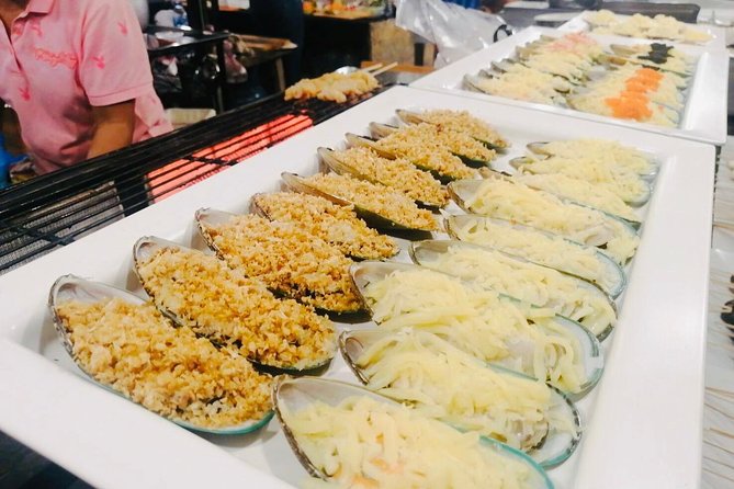 Iconic Sunset Safari with Monkey Hill & Street Food Experience - Sampling snacks at Chillva Market