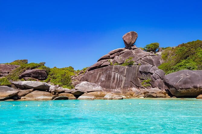 Phang Nga Bay Day Trip to Panak and James Bond Island by Speedboat from Phuket - Koh Rang Yai for a warm-water finish