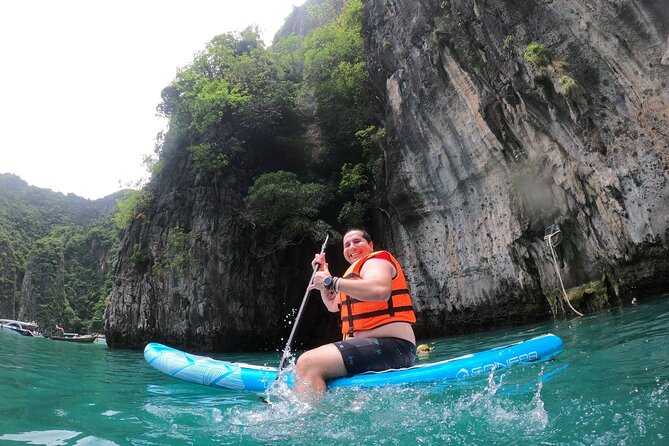 Phi Phi Island Adventure Day Tour from Phuket Speedboat/Catamaran - Cruising past the cliffs of Phi Phi Leh