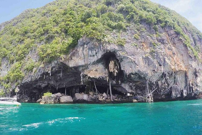 Phi Phi Islands One Day Tour by Speedboat From Phuket - Viking Cave from the water