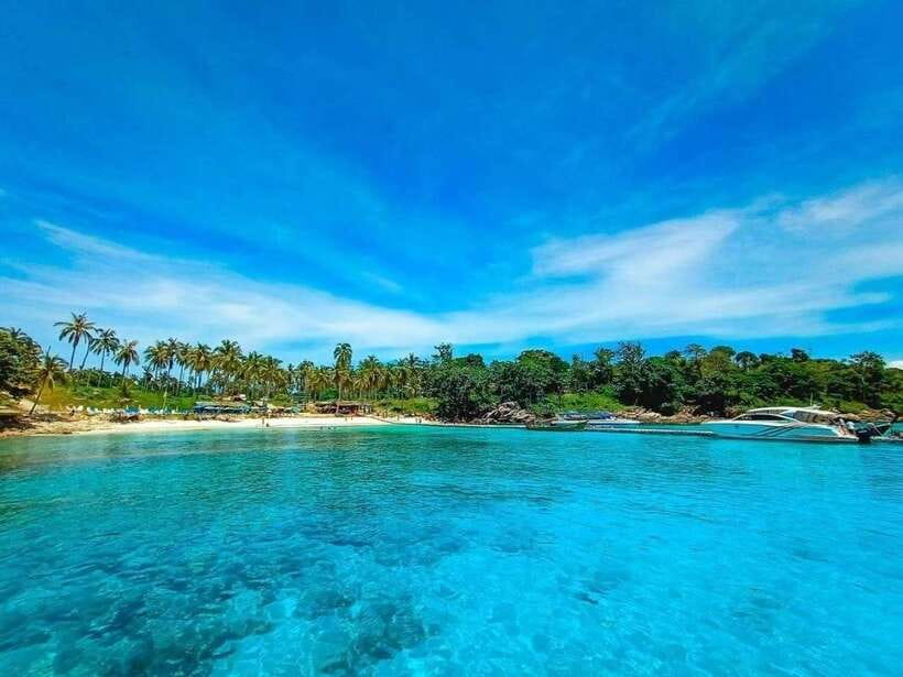Phuket: Coral Yacht Boat Tour to Coral Island with Sunset - Pirates Beach: the first chance to swim and snorkel