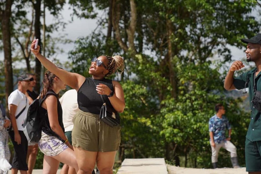 Phuket: Guide Tour to Patong Elephant Sanctuary - Cutting banana trees and gathering grass