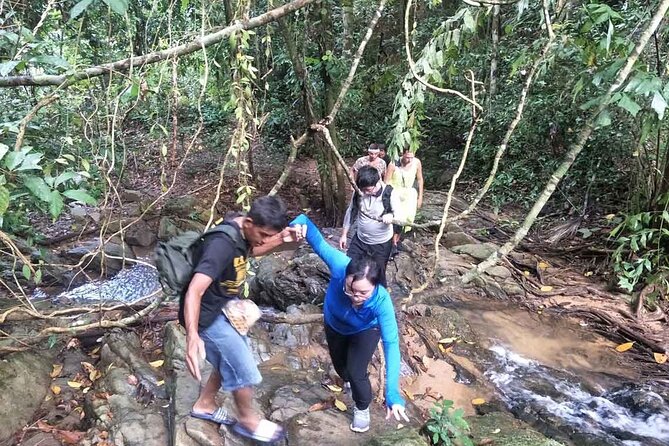 Phuket Jungle Trekking Experience at Khao Phra Taew National Park - Booking details and weather concerns