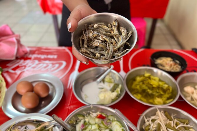 Phuket Old Town Food Tour with 10+ Locals' Favorites Tastings - Inside a fourth-generation bakery
