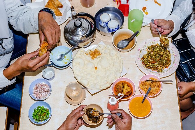 Southern Flavors Phuket Food Tour with 15+ Tastings - Hokkien noodles, spring rolls, and Phuket sausage
