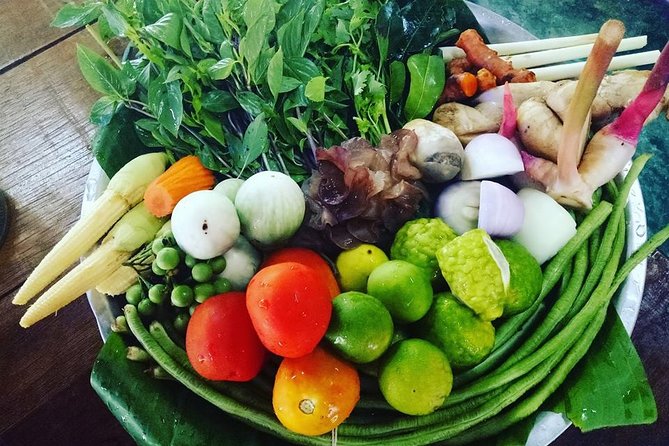 Vegetarian Organic Thai Cooking Class and Market Tour in Phuket - Cooking in an open-air organic garden kitchen